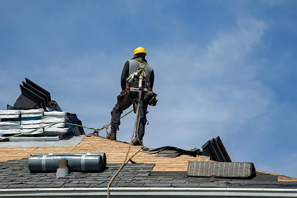 Professional Roof Replacement technician working in Ruby, NY